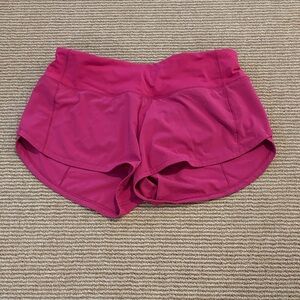 Hot pink lululemon speed up shorts